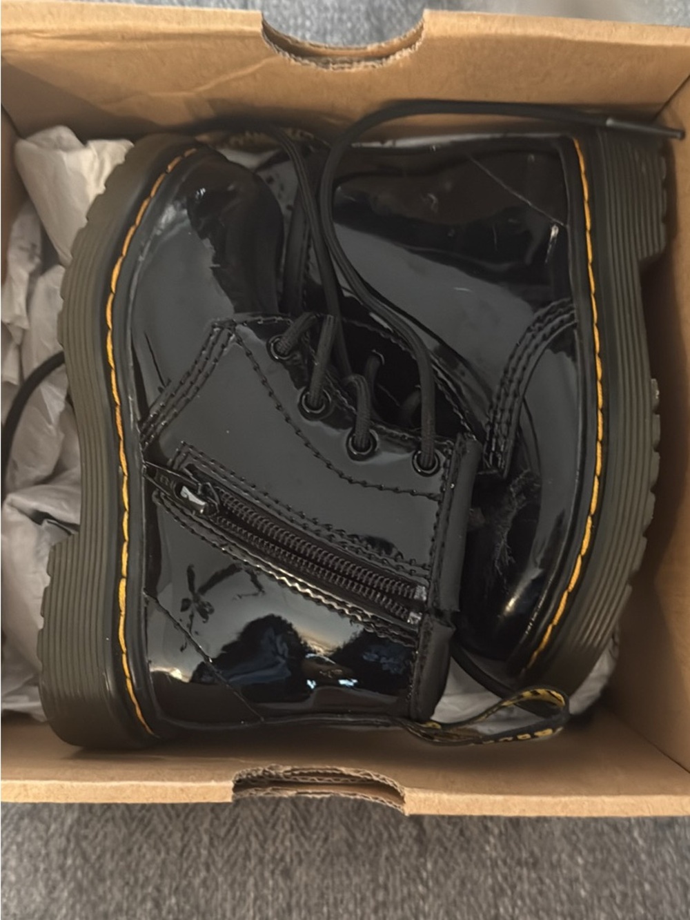Dr. Martens Kids Black Patent Lace-Up Boots with Yellow Stitching